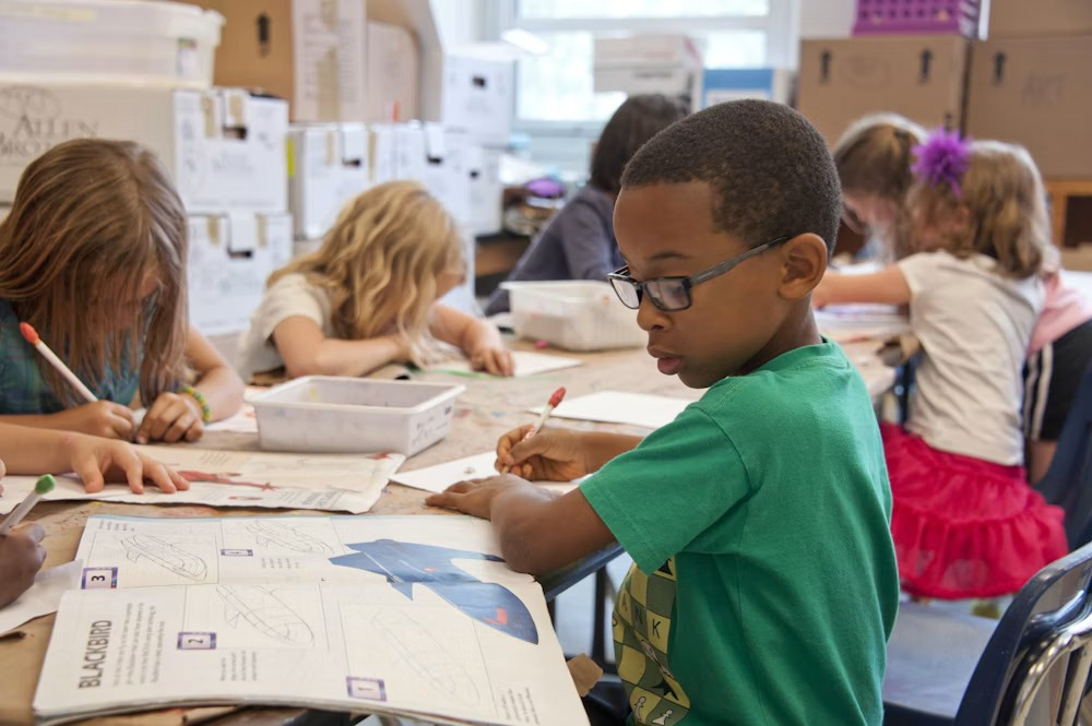Children learning together at a classroom table